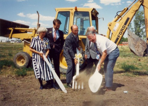 P2014-26_, Gov Sullivan at groundbreaking for Meals on Wheels, Cheyenne, with giant cutlery, Summer 1992