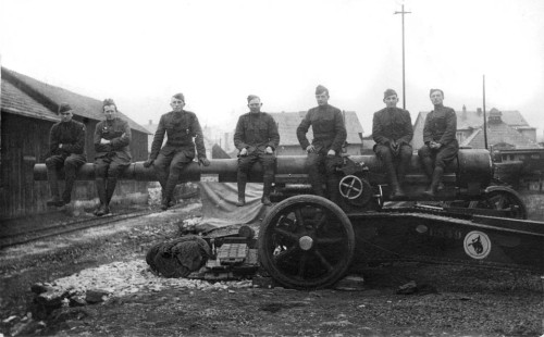 "C Battery Boys at Hohr, Germany", 1917-1919. Note the bucking horse stencil that designated the Wyoming troops' unit. (WSA No Neg, real photo postcard)